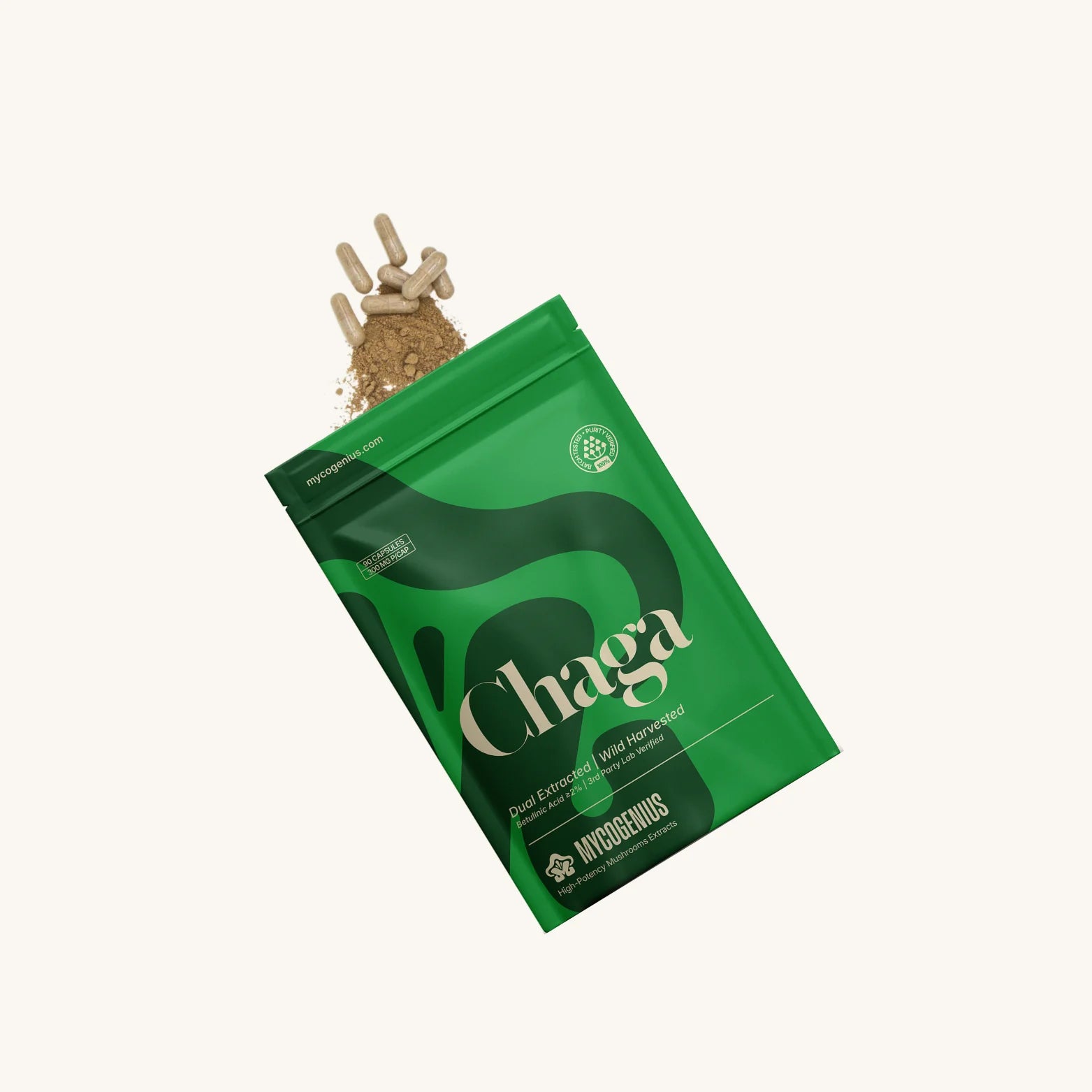 Green package of Chaga mushroom with a small amount of mushroom extracts visible on a white background